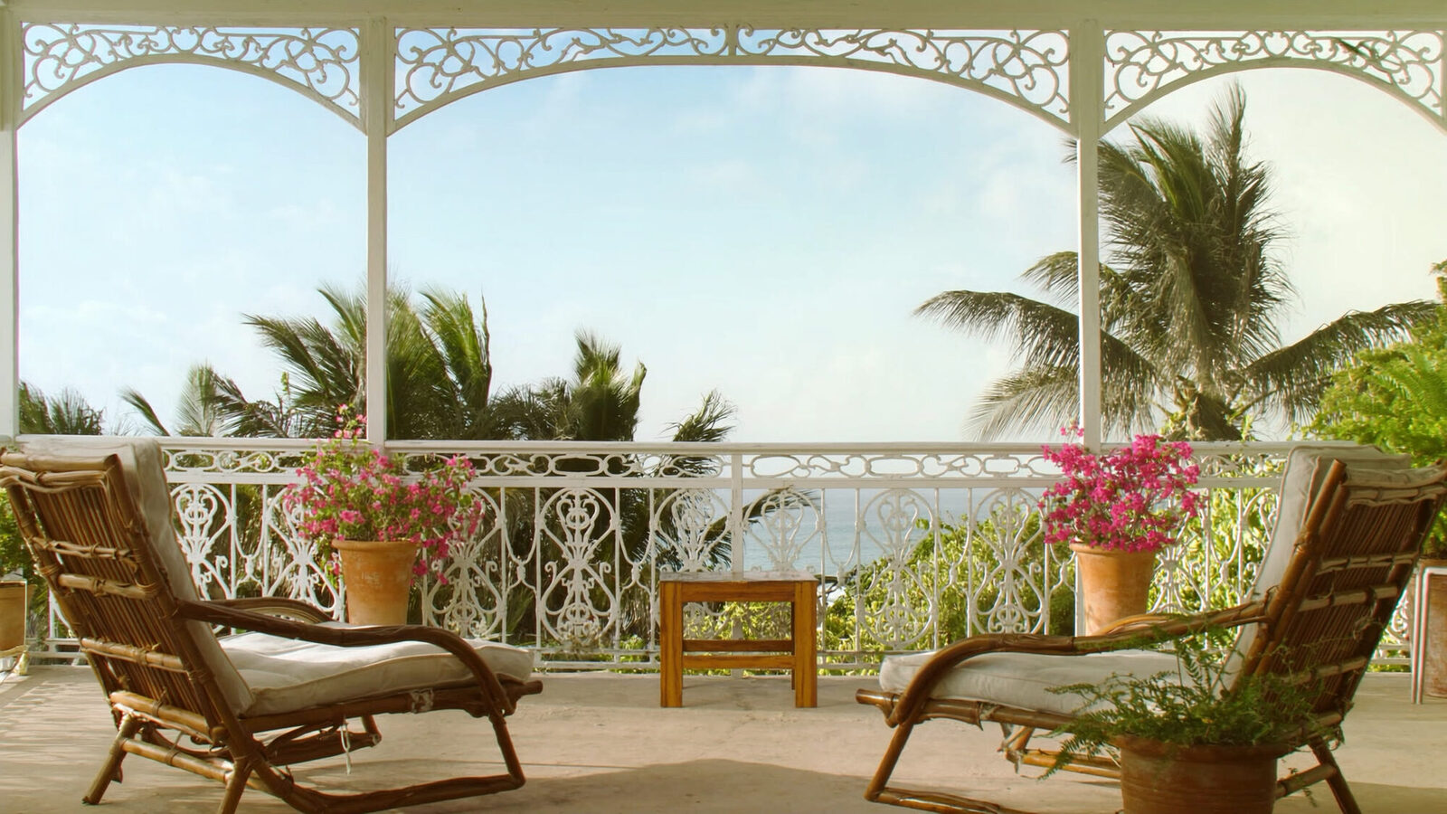 A veranda framed by fretwork arches